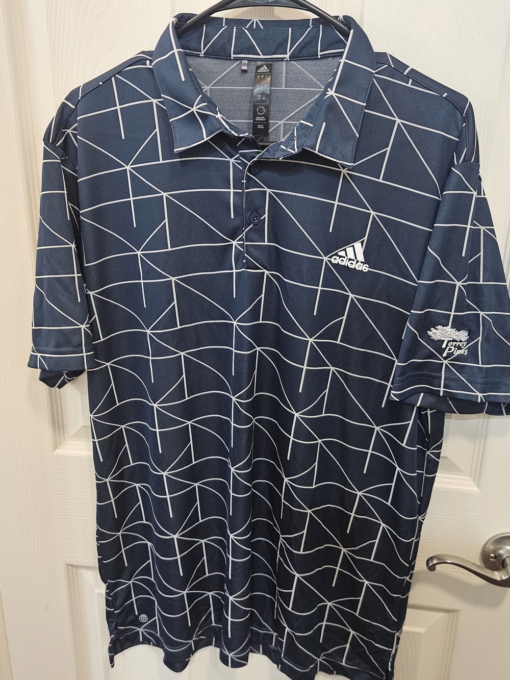 Torrey Pines Adidas Navy Polo with White Geometric Lines